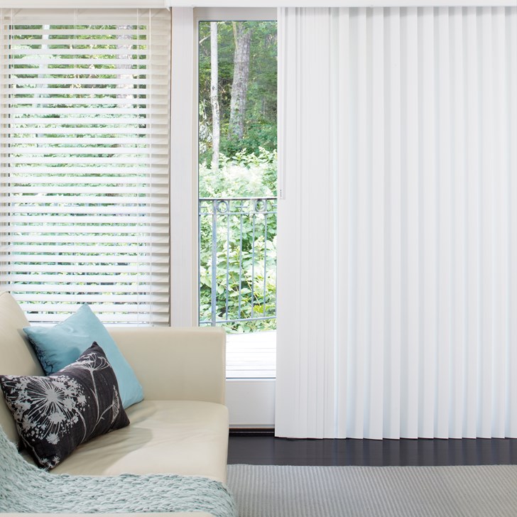 A durable alternative to drapes, S-Shaped Vertical Blinds are ideal for large windows and sliding glass doors. Color: White