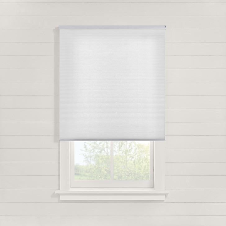 Motorized Light Filtering Cellular Shades in the White Chiffon color and outside mount.